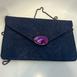 Never used carved clutch/Shoulder bag